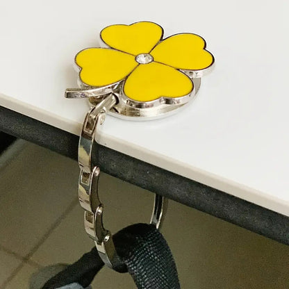 Gancho para bolso con forma de trébol de cuatro hojas