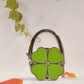 Gancho para bolso con forma de trébol de cuatro hojas