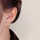✨ ¡OFERTA POR TIEMPO LIMITADO 50% DE DESCUENTO! 💎 Aretes de Garra Brillante con Diseño de Estrella y Gema Colgante – Elegancia Sin Esfuerzo ✨