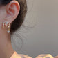 ✨ ¡OFERTA POR TIEMPO LIMITADO 50% DE DESCUENTO! 💎 Aretes de Garra Brillante con Diseño de Estrella y Gema Colgante – Elegancia Sin Esfuerzo ✨