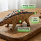 Soportes creativos para mazorcas de maíz con forma de dinosaurio