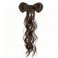 Coleta con lazo para un look glamuroso al instante